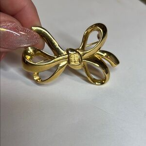 Signed GIVENCHY VTG Gold Tone Bow Brooch.